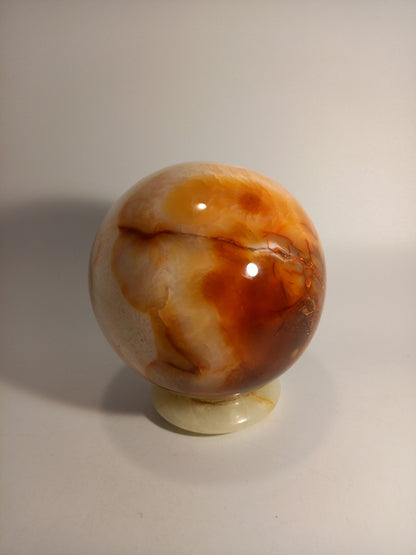 Carnelian Crystal Polished Sphere 5" Decor on Green Onyx Stand