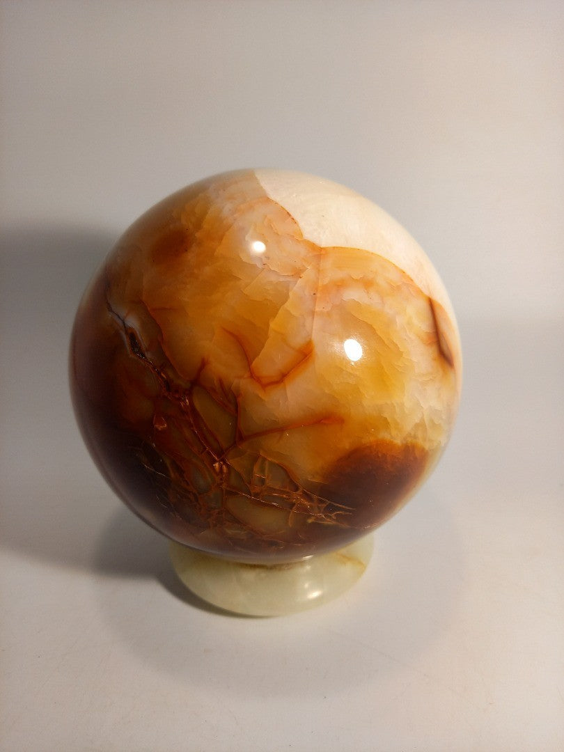 Carnelian Crystal Polished Sphere 5" Decor on Green Onyx Stand