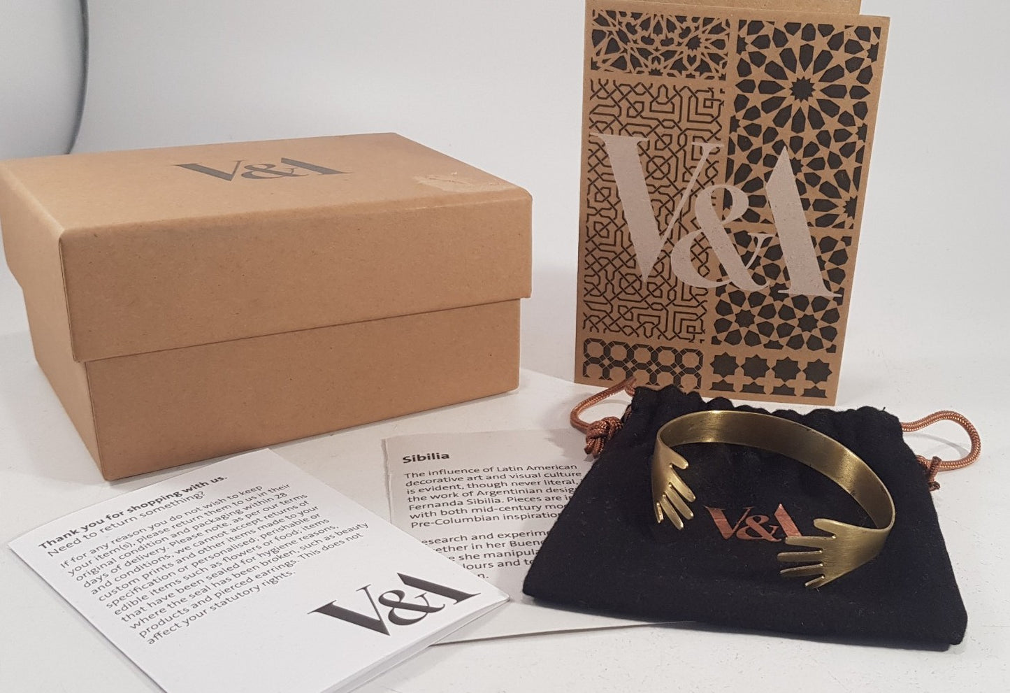 V&A Jewellery Gold Tone Hands Bracelet with Original Box Pouch Cards VGC