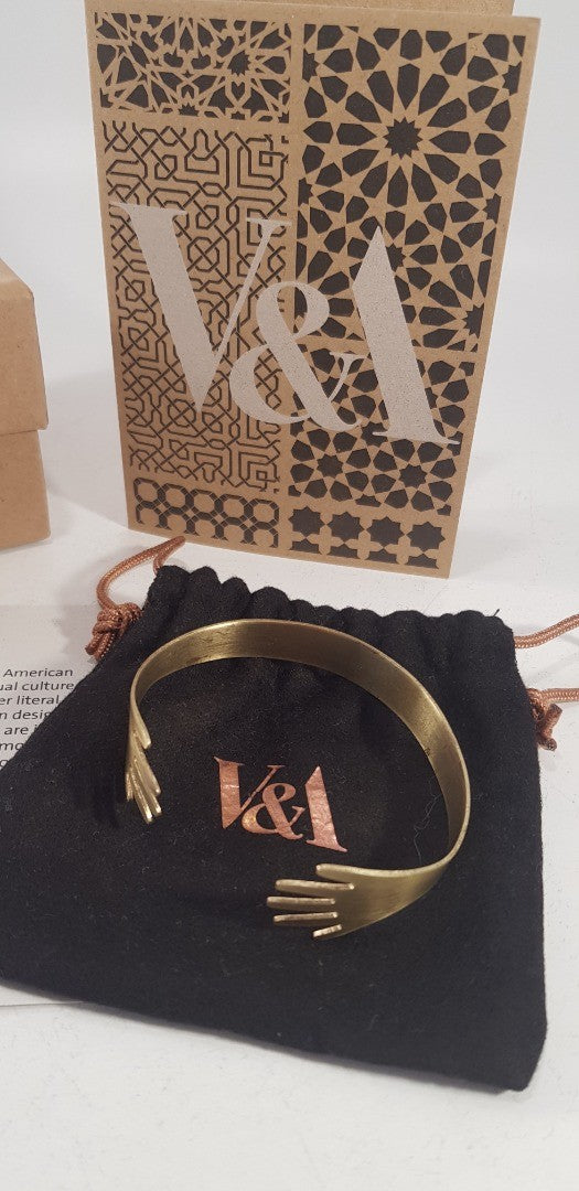 V&A Jewellery Gold Tone Hands Bracelet with Original Box Pouch Cards VGC