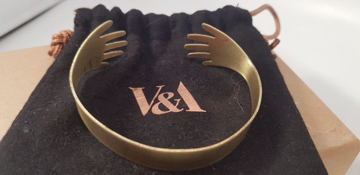 V&A Jewellery Gold Tone Hands Bracelet with Original Box Pouch Cards VGC