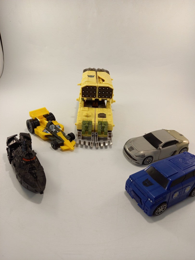 transformers toys cars into figures x5 yellow blue grey and black bundle