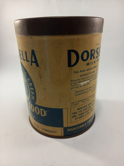 vintage tin dorsella milk food good vintage condition  5.5in tall