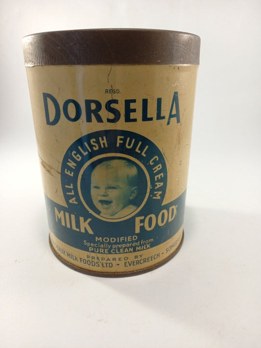 vintage tin dorsella milk food good vintage condition  5.5in tall