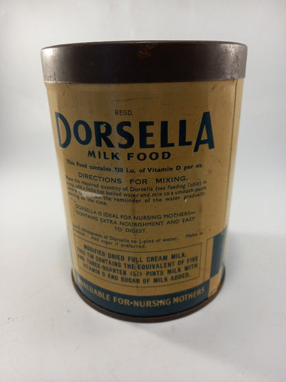 vintage tin dorsella milk food good vintage condition  5.5in tall